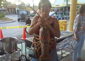 Girl holding huge lobster