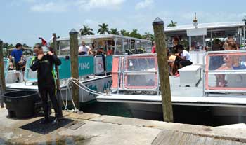 2 Dive boats loaded with divers and snorkelers