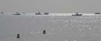 Boat at dawn on the water across from Pompano Beach lobstering