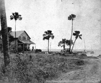 Old wooden house wiith porch on the water, picture taken 1870's