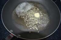 After cleaning out pan add butter, oil, garlic Garlic in cleaned frying pan