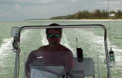Capt Sam driving the boat