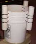 5 gallon bucket with rod holders attached with zip ties