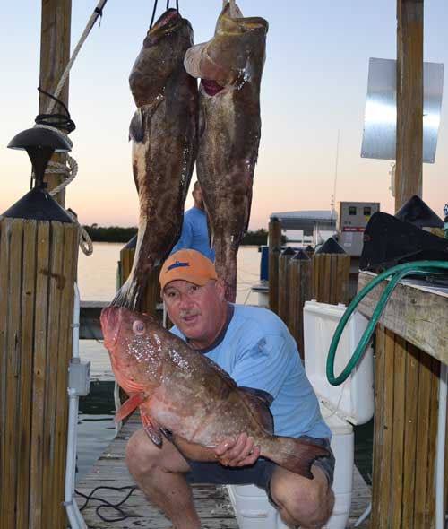 John "JR" Rossetti catches two 70 lb grouper