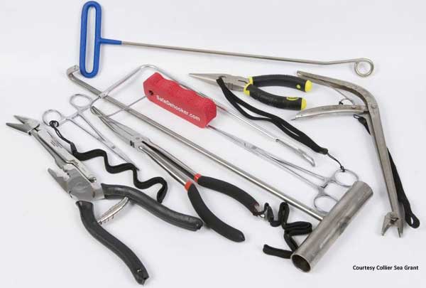 A variety of dehooking devices