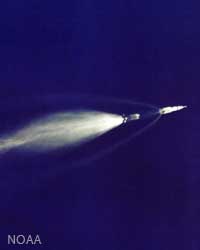 F-1 engine disengaging from Apollo 11 in space
