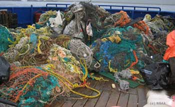 Piles of ghost nets on a boat