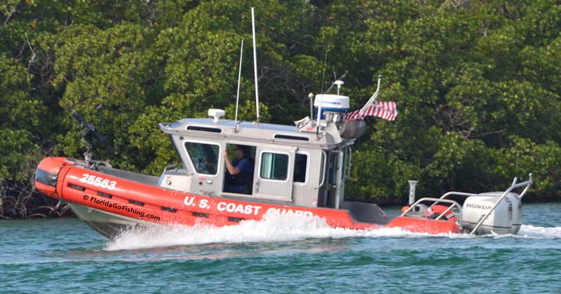 coast guard boat with machine gun on front