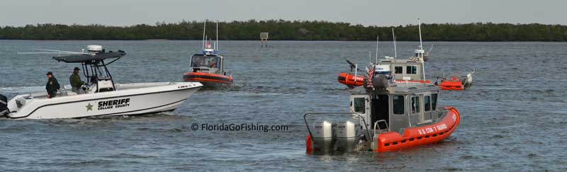USCG boats and a collier county law enforcement boat assembles after dropping off the vice presient