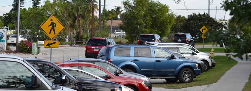 procession of black suv's leaving isles of capri