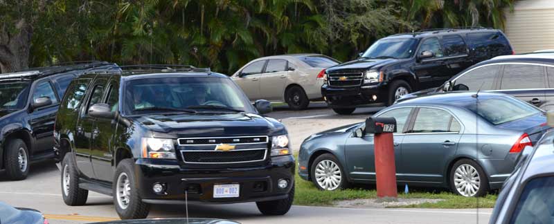 2 black suvs leave the fire station