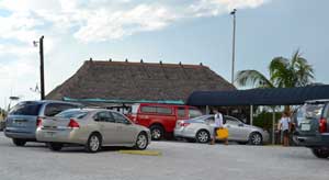 Pelican Bend parking lot with tiki in background