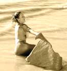 Mermaid holding tail
