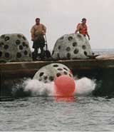 Reef Balls being deployed from boat