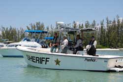 Sheriff Boat with lots of cops